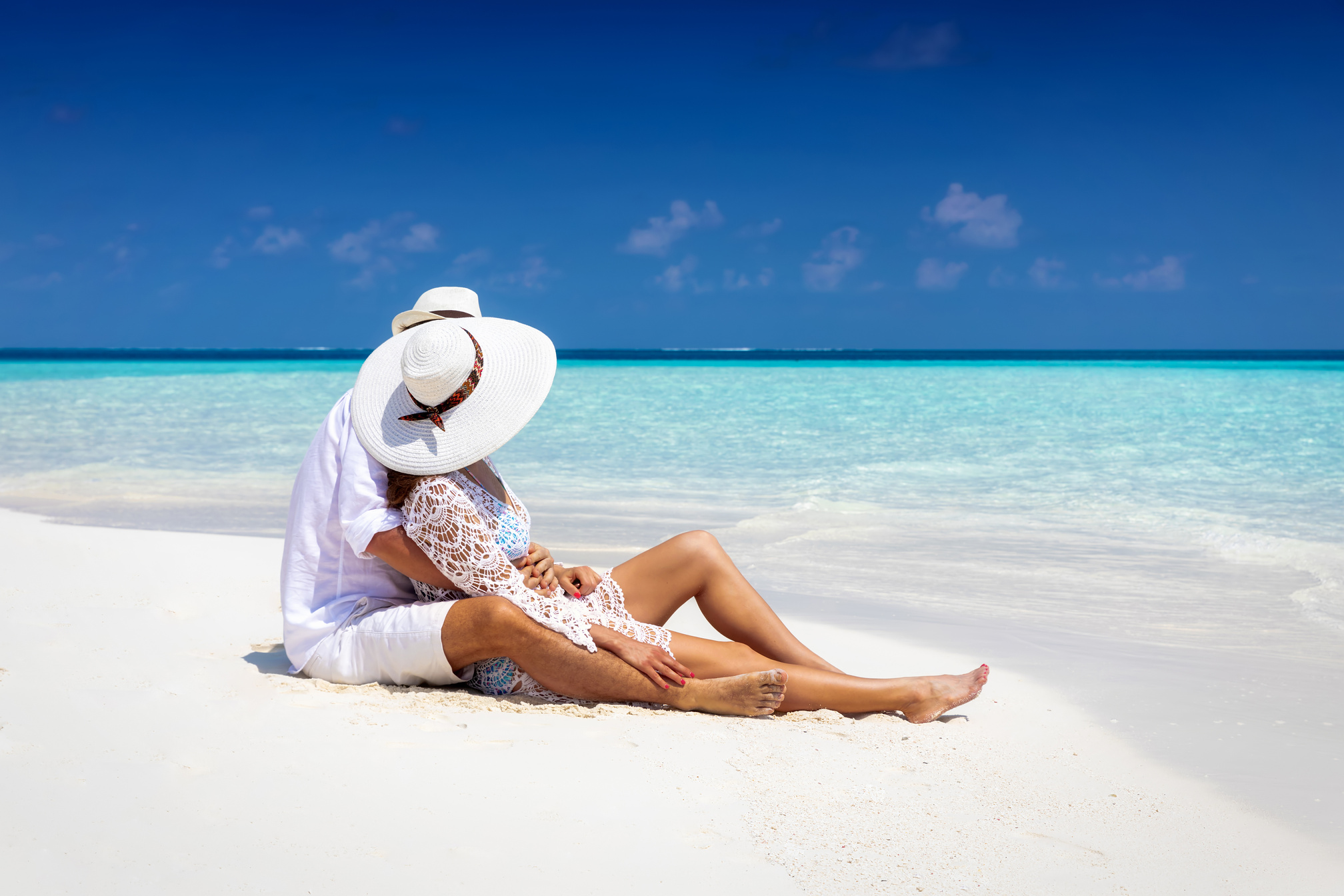 Couple enjoys their honeymoon in the Maldives